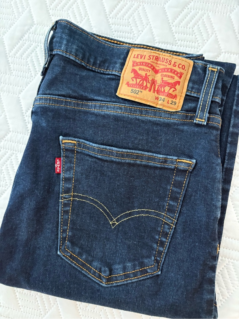 Levi’s 502 dark rinse denim stretch cropped